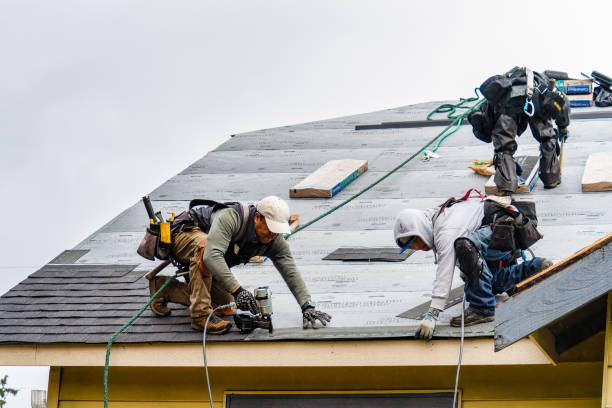 Professional Gutter Installation technician working in Ashley, PA